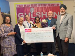 Presentation of Cheque to MND Association by Harjinder and Harinder Singh Mangat 