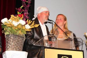 Ritchie Dave Porter and Debra Susan collecting their award