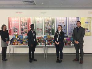 Supporting image for story: Pupils help food bank through harvest festival