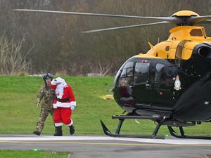 Supporting image for story: 'I was worried I wouldn’t see him before Christmas!' Santa swaps sleigh for helicopter to visit Telford hospital