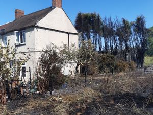 Supporting image for story: Scary photos show just how close a fire came to engulfing a Shropshire house 