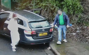 Two fly tippers pull up in Turner Street, Dudley, in a grey Toyota estate car