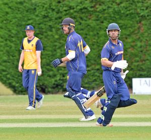 Left , Tom Whitney and Iftikhar Khan help a Shropshire CCL representative side see off Shropshire CCC at Wellington.