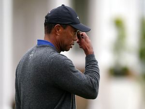 Supporting image for story: Tiger Woods cuts frustrated figure after 79 leaves him fighting to make Open cut