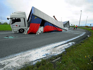 Supporting image for story: Traffic chaos as milk lorry overturns near Cannock
