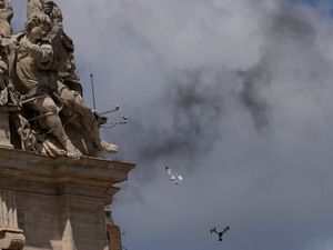 Supporting image for story: More black smoke from Sistine Chapel signals wait for new pope goes on