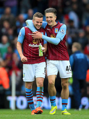 Aston Villa's Tom Cleverley (left) and Jack Grealish celebrate after the game.