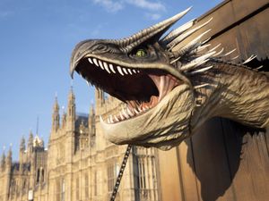 Supporting image for story: Giant Hungarian Horntail dragon stuns onlookers at it roars through London