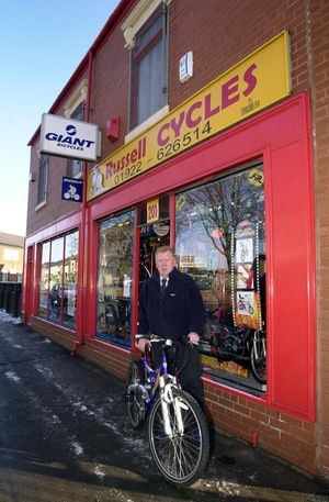 Sue's father Gordon Russell at the shop in 2004