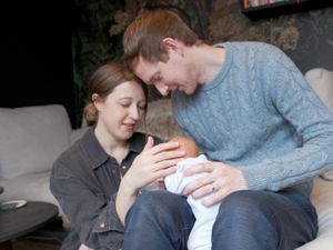 Grace and Angus Davidson with their baby Amy, born after the first UK womb transplant