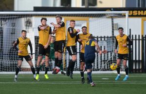 Kyle Hammond takes a free kick..