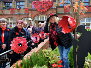 Supporting image for story: Knitwear and bottles used for 10,000-poppy display in Darlaston