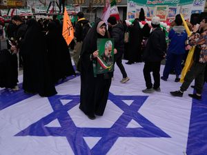 Supporting image for story: President apologises over crackdown as Iran marks 1979 Islamic Revolution