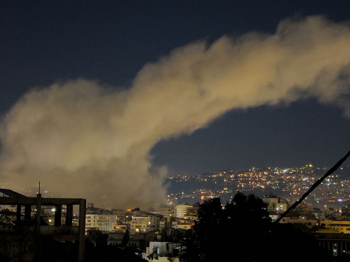 Israel launches strikes on Beirut after Hezbollah fires missiles across border