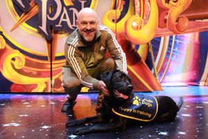 Matt Slack with a guide dog puppy. 