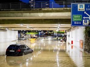 Supporting image for story: Clean-up begins after sudden storms flood roads and halt air traffic in Geneva