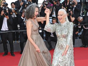 Supporting image for story: Dame Helen Mirren and Andie MacDowell dance down Cannes red carpet