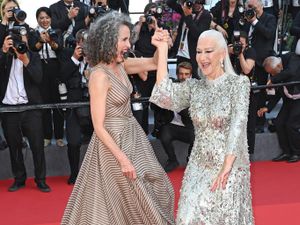 Supporting image for story: Dame Helen Mirren and Andie MacDowell dance down Cannes red carpet