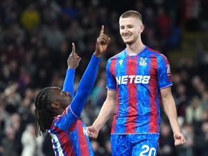 Crystal Palace’s Eberechi Eze (left) celebrates scoring with Adam Wharton