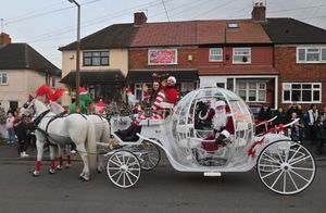 Santa (Dave Parsons), Jim Morris and Abbie Kiteley with horses Saylo and Mylo from Victorian Carriages.
