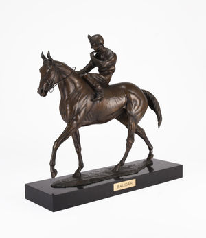The Bernard Winskill bronze of racehorse Balidar with jockey Lester Piggott that sold for £2,100.