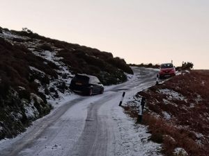 Supporting image for story: Drivers 'ignoring road closed signs' to head up icy road at beauty spot