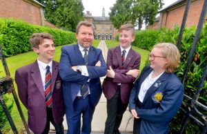 Nick with pupils Will Cuhls, 14, Kieran Powell, 13, and Molly Morgan, 17