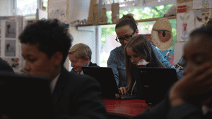 Students use Chromebooks in an Art lesson