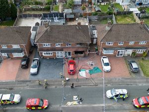 Emergency services at Plascom Road in Wolverhampton after the fatal house fire