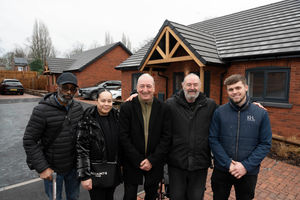 Longford Road bungalow resident Earl Dixon with his daughter Yazmin Forrester, Cllr Steve Evans - the council's deputy leader and cabinet member for city housing, Stephen Spencer - Longford Road bungalow resident, and Keon Homes' site manager Harvey Brand outside the new bungalows
