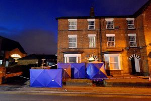 Police tents outside Wolverhampton Road in Stafford in the aftermath of the attack