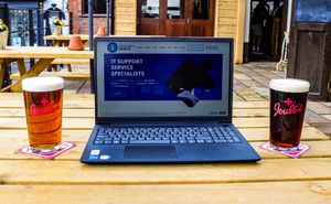 Information Solutions laptop with top ales from Joules Brewery at The Stag, Market Drayton.