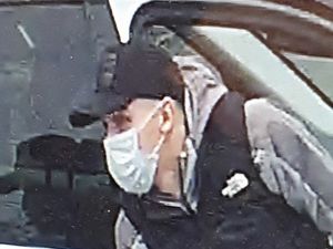 Supporting image for story: Range Rovers stolen from Cannock supermarket car park - police issue picture of man they want to speak to
