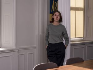 Sally Rooney in a grey top