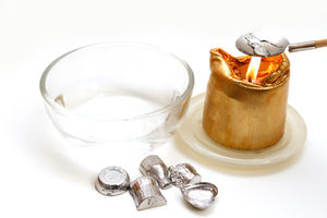 New Year's Eve custom of telling fortunes by the shapes made by molten lead dropped into cold water