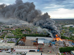 Supporting image for story: Several roads reopen after major Tipton scrapyard blaze as fire crews revisit site