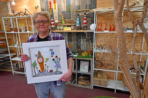 Nadia with one of her fused glass creations