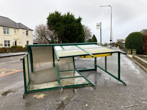 A bus shelter on its side in Dechmont in West Lothian