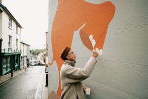 An Elephant mural has been painted on the side of the Bishop Castle Town Hall by Bamber Hawes of Bishops Castle