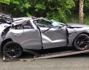 Jaguar cars were damaged after a car transporter hit a bridge in Shrewsbury