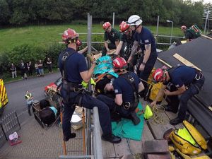Supporting image for story: Worker rescued after fall from roof