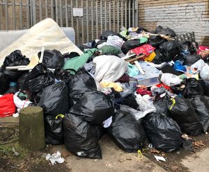 The fly-tipped rubbish before it was set alight