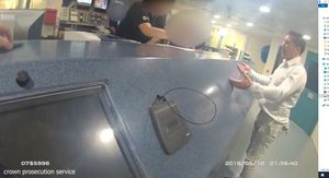 Officers explain to Saunders that he will be charged with failing to provide a specimen. Footage: CPS