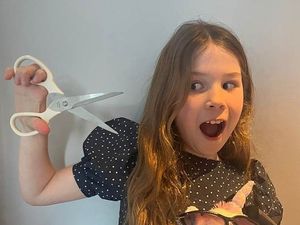 Supporting image for story: 'Caring, thoughtful, and with just the right amount of crazy' – nine-year-old Evelyn ready to chop her locks for charity