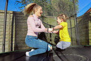 Bouncing on the trampoline with Elle