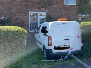 Supporting image for story: Man taken to hospital after van crashes through wall into West Bromwich family's front room