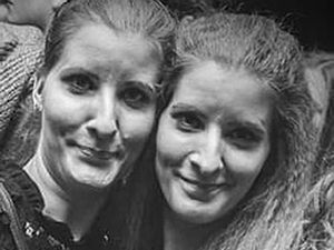 Supporting image for story: Bodies recovered from river formally identified as missing sisters