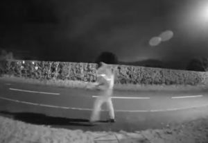 Police have released CCTV footage after a house in Morda, near Oswestry, was targeted in a racially aggravated criminal damage incident