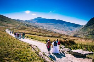 Maxine's fundraisers as they climbed Snowdon in wedding dresses