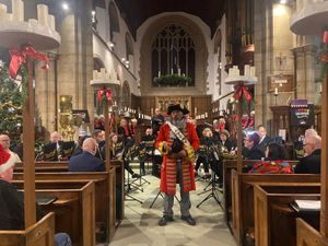 Town Crier Adrian Basford at the start of the evening.